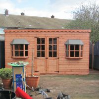 pent summer house with bay windows 1
